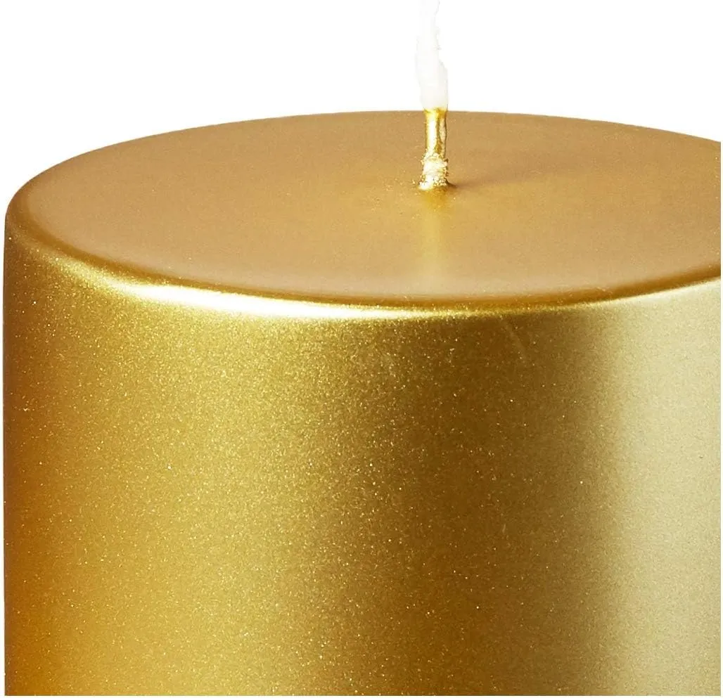 Exquisite Pack of 4 Elaborately Sculpted Metallic Pillar Candles, Showcasing an Exquisite Symphony of Artistry, Beauty, and Radiant Gold, Emanating an Aura of Sublime Luxury